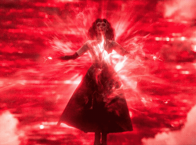 Woman In Red Dress Surrounded By Red Lights And Smoke GIF