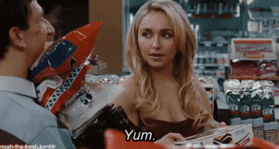 Woman In Red Dress Talking Saying Yum GIF