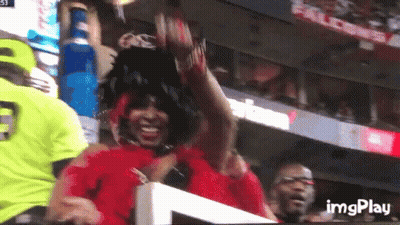 Woman In Red Dress Watching Game With Imgplay GIF