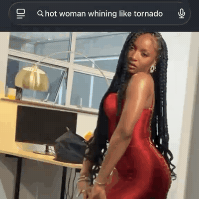 Woman In Red Dress Whining Like Tornado GIF
