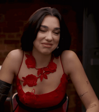 Woman In Red Dress With Arm Tattoo Saying I GIF