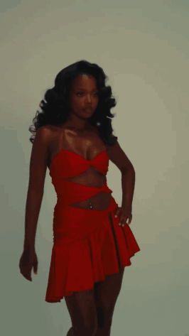 Woman In Red Dress With Belly Button Piercing GIF