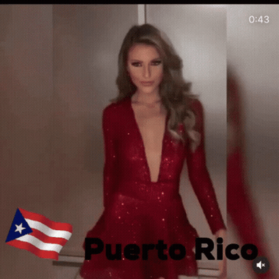 Woman In Red Dress With Puerto Rico Flag GIF