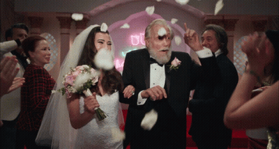 Woman In Red Dress With White Cake GIF