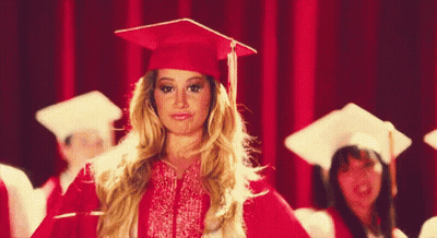 Woman In Red Graduation Cap And Gown GIF