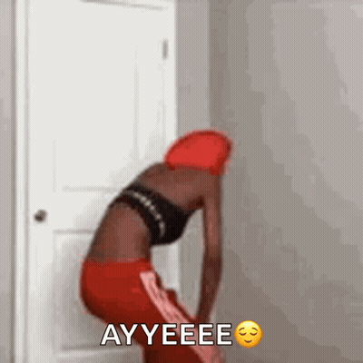 Woman In Red Hat And Pants Saying Ayyeeee GIF
