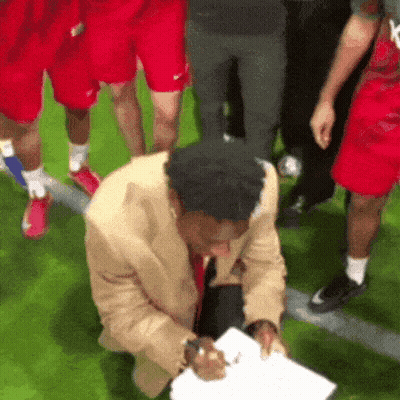 Woman In Red Hat With Coach GIF