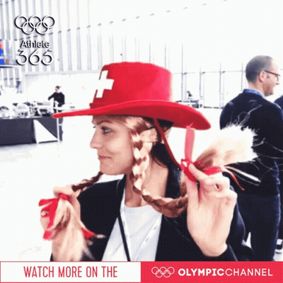 Woman In Red Hat With Cross GIF