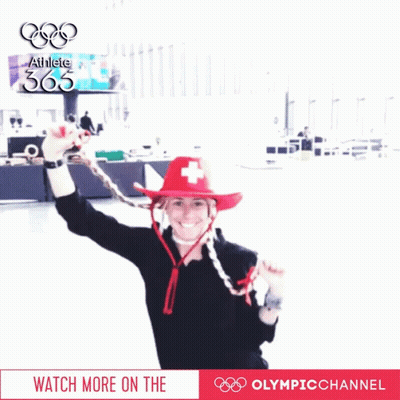 Woman In Red Hat With Swiss Cross And Athlete 365 Sign GIF