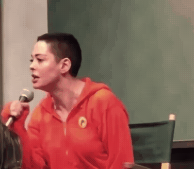 Woman In Red Hoodie Holding Microphone GIF