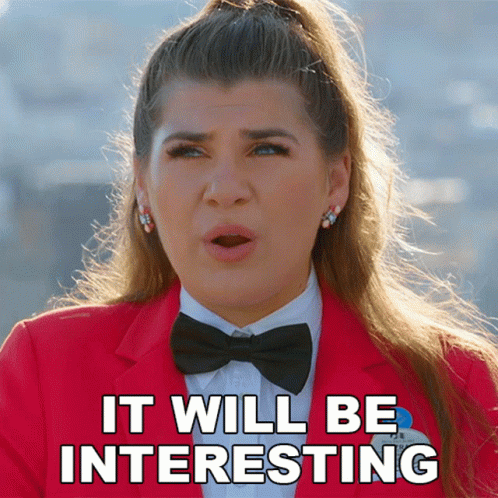 Woman In Red Jacket And Black Bow Tie Says Interesting GIF