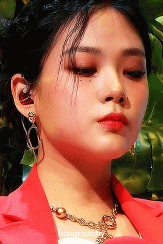 Woman In Red Jacket And Gold Necklace Saying Hongminch GIF