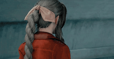 Woman In Red Jacket And Necklace GIF