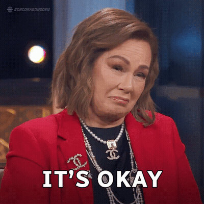 Woman In Red Jacket And Pearls Says Okay GIF