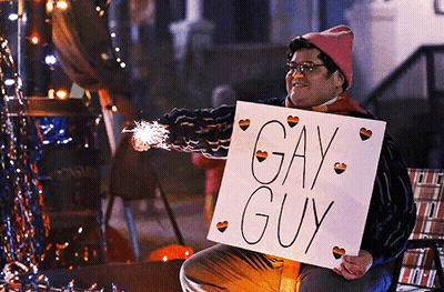 Woman In Red Jacket Holding Gun In Front Of Clock At 3:40 GIF