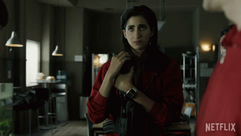 Woman In Red Jacket Holding Gun GIF