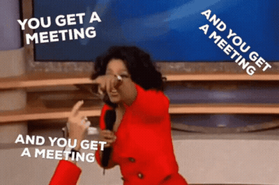 Woman In Red Jacket Holding Microphone Saying You Get A Meeting GIF