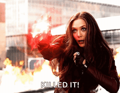 Woman In Red Jacket Holding Red Object Saying Killed It GIF
