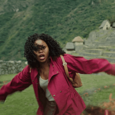 Woman In Red Jacket In Field GIF