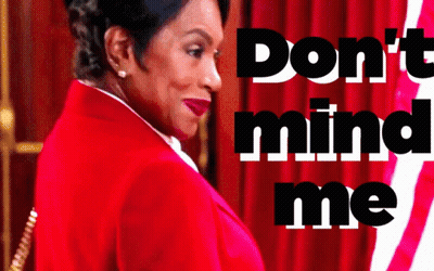 Woman In Red Jacket Saying Don't Mind Me GIF