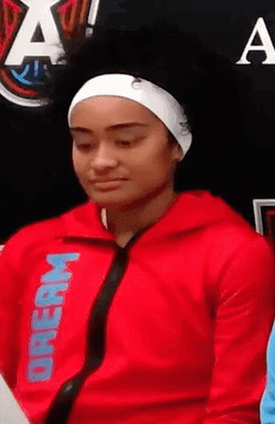 Woman In Red Jacket Saying Dream GIF
