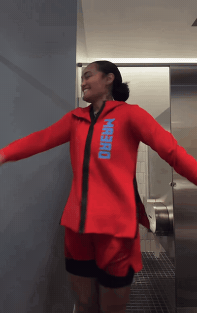 Woman In Red Jacket Saying Hybrid GIF