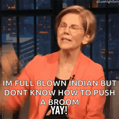 Woman In Red Jacket Saying Im Full Blown Indian GIF