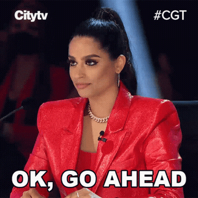 Woman In Red Jacket Saying Ok Go Ahead GIF