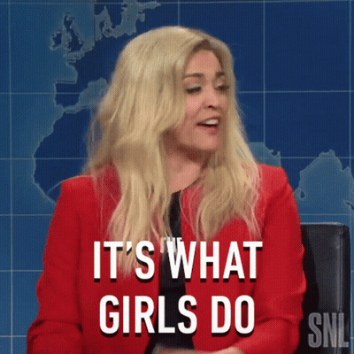 Woman In Red Jacket Says It's What Girls Do On SNL GIF