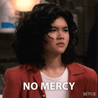 Woman In Red Jacket Says No Mercy GIF