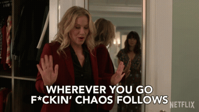 Woman In Red Jacket Says Wherever You Go F*cking Chaos Follows GIF