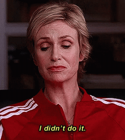 Woman In Red Jacket Sitting Says Ask Tough Questions GIF