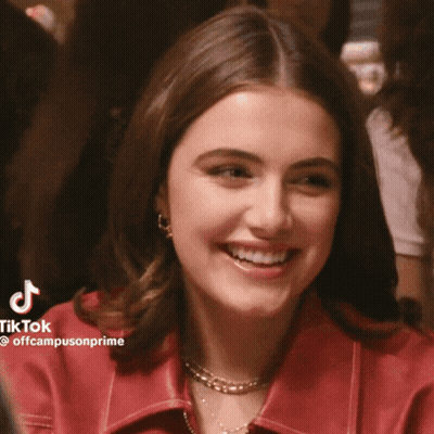 Woman In Red Jacket Smiling GIF
