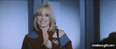 Woman In Red Jacket Smiling GIF