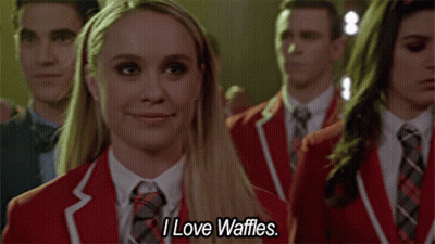 Woman In Red Jacket Smiling Says I Love Waffles GIF