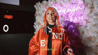 Woman In Red Jacket With E GIF