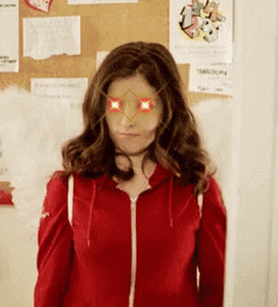 Woman In Red Jacket With Glasses GIF