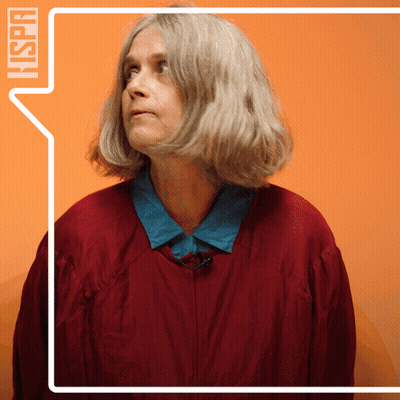 Woman In Red Jacket With Hispan Speech Bubble GIF