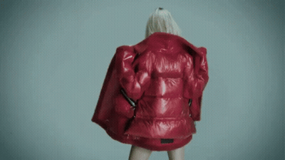 Woman In Red Jacket With Moncler On Back GIF