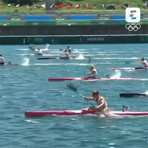 Woman In Red Kayak With Number 19 GIF