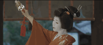 Woman In Red Kimono Holding Sword With Red Tag GIF