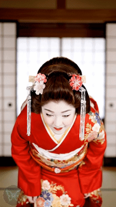 Woman In Red Kimono With Flowers Bowing Head GIF