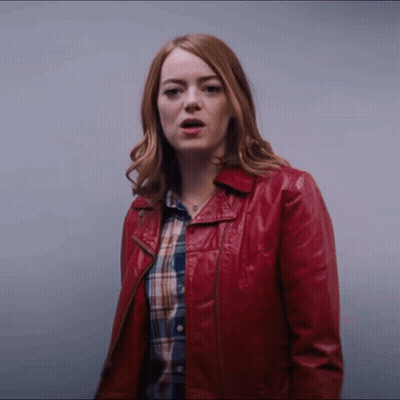 Woman in Red Leather Jacket and Plaid Shirt