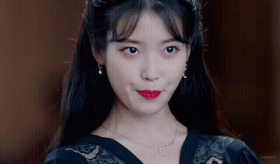 Woman In Red Lipstick And Necklace GIF