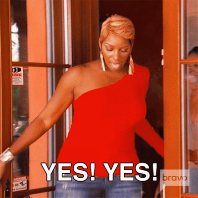 Woman In Red One Shoulder Top Saying Yes GIF