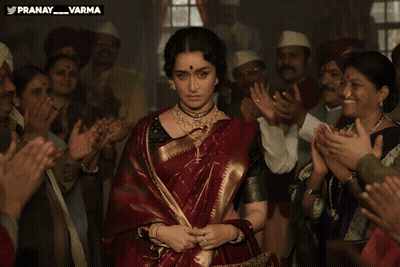 Woman In Red Saree Standing Before Crowd With Pranay_varma GIF