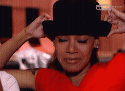 Woman In Red Shirt And Top Hat Saying Team GIF