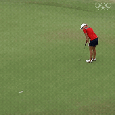 Woman In Red Shirt And White Hat Putting Golf Ball GIF