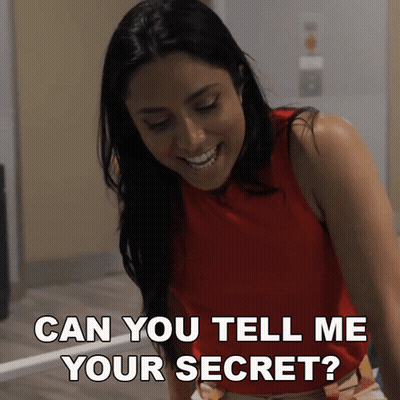 Woman In Red Shirt Asking Can You Tell Me Your Secret GIF