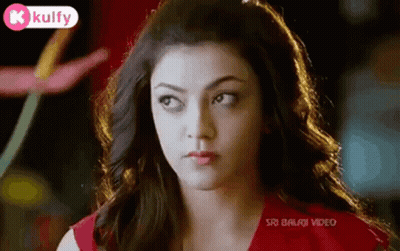 Woman In Red Shirt Close Up GIF